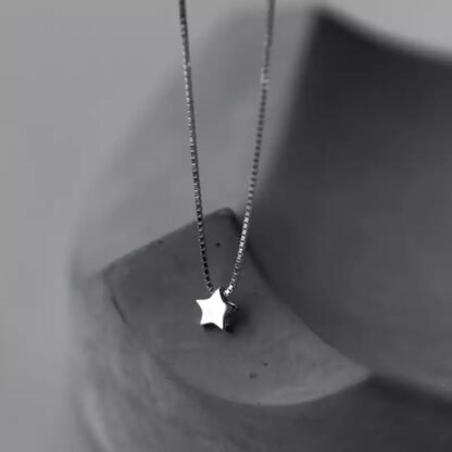 collier avec petite etoile argent