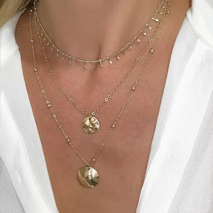 Collier trois rangs tendance 2024